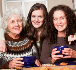 two happy grandma with their caretaker